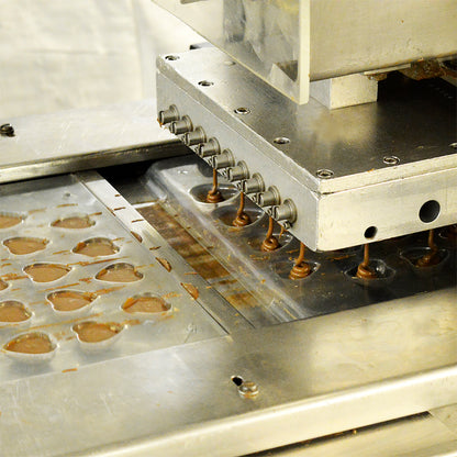 chocolate hearts being moulded 