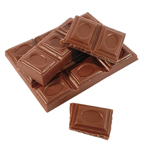 unwrapped milk chocolate bar broken into chunks